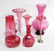 Pair cranberry glass trumpet vases, each with EPNS circular stepped stand, 23cm high,