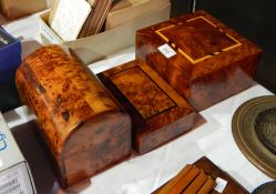 A Moroccan thuya wood domed box with fitted interior,