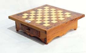 Two decorative Moroccan thuya wood and inlaid chess boards on single drawer stand and pieces