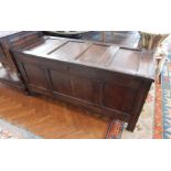 Early 18th century oak coffer, the four panel top above a plain frieze,