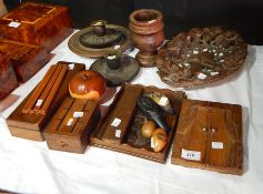 A quantity of treen to include a carved lime wood oval bowl, a turned wood mortar,