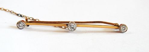 Diamond bar brooch set one large and pair smaller diamonds