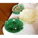 A quantity of Victorian and later leaf moulded pottery plates in varying colours