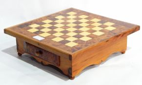 Two decorative Moroccan thuya wood and inlaid chess boards on single drawer stand and pieces