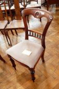 Four dining chairs with floral engraving,