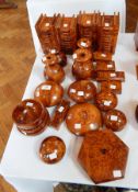 A collection of Moroccan decorative thuya wood to include hexagonal lidded pot, bowls, etc.