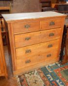 A Victorian pine chest of two short and three long drawers, on plinth base,