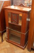 Late 19th century mahogany cabinet, with glazed mirror door enclosing adjustable shelves,