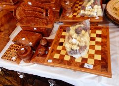 A collection of Moroccan decorative thuya wood to include chess set, photograph frames, boxes,