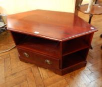 A stained wood television stand with drawer to base, 104cm wide,