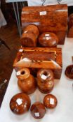 A collection of Moroccan decorative thuya wood to include decorative pots, dome topped casket,
