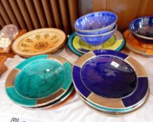 A quantity of Moroccan brightly glazed silver-coloured metal mounted pottery bowls and continental