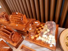 A collection of Moroccan decorative thuya wood to include large inlaid box, letter racks, chess set,