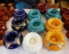 A quantity of Moroccan coloured glazed pottery ashtrays,