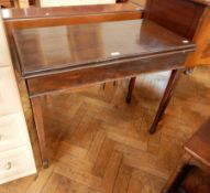 Georgian-style mahogany foldover top tea table on square tapering legs,