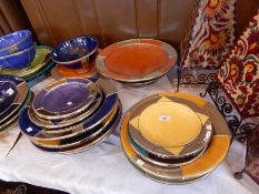 A quantity of Moroccan brightly coloured and silver-coloured metal mounted bowls