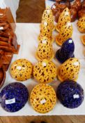 Moroccan brightly glazed pierced pottery candle covers
