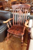 A mahogany Windsor rocking chair