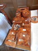 A collection of Moroccan decorative thuya wood to include solitaire set, photograph frames, boxes,