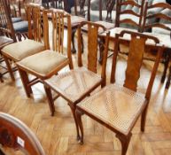 Two stickback chairs with woven seats, block supports,