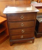 Stag furniture chest of four drawers raised on bracket feet,