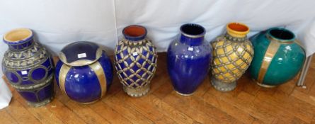 A quantity of Moroccan brightly glazed and silver-coloured metal mounted vases (6)