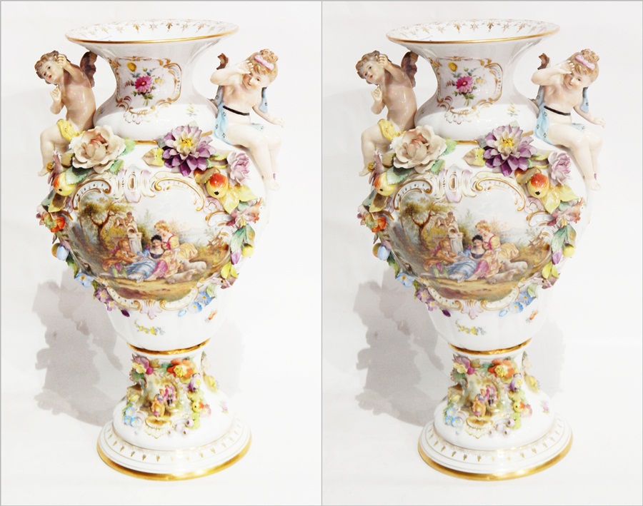 A pair of Meissen style baluster vases, possibly Carl Thieme,