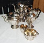 A silver plated five-piece tea and coffee set comprising tea and coffee pot, hot water jug,