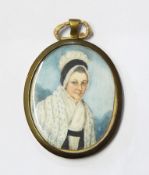 19th century English school Miniature Head and shoulders portrait of a lady in period dress, oval,