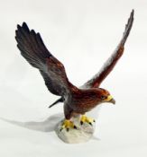 A Beswick golden eagle ceramic model No.