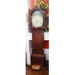 An early 19th century oak longcase clock, with swan neck pediment,