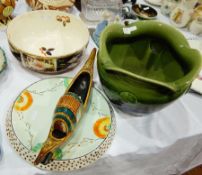 An Arthur Wood bowl decorated in the Imari pallet, a green pottery jardiniere,