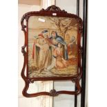 A Victorian petit point woolwork tapestry panel gratescreen, religious scene,