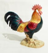 A Beswick model of a leghorn chicken,