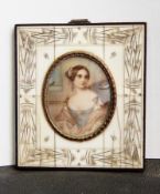 20th century miniature on ivory Head and shoulders portrait of a lady in blue dress with pink shawl,