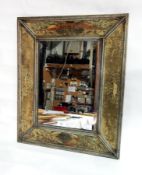 An antique silver painted framed mirror with tapestry,