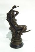 Bronze figure of female nude seated in crescent moon with stepped base and circular marble plinth,