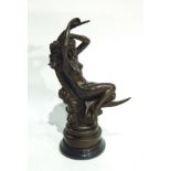 Bronze figure of female nude seated in crescent moon with stepped base and circular marble plinth,