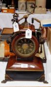 A 19th century Empire style red and black marble cased mantel clock with ormolu mounts, black dial,