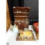 A child's kitchen dresser with various miniature items viz: sewing machine and a quantity of teddy