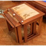 A nest of three rectangular tiled top occasional tables, Danish style, stamped "Keith Eatwell",