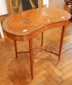 An Edwardian Kingwood kidney shaped side table, the top painted with figures of cavaliers,