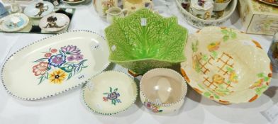 Three items of Poole pottery, floral decorated with dash borders,