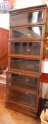 An oak six tiered Globe Wernicke sectional bookcase by "The Globe Wernicke Co.