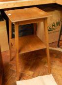 An oak two-tier square occasional table,