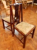 A pair of mahogany Chippendale style dining chairs with open splat backs,