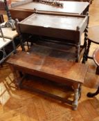 An oak tea trolley with side drawer and undershelf,