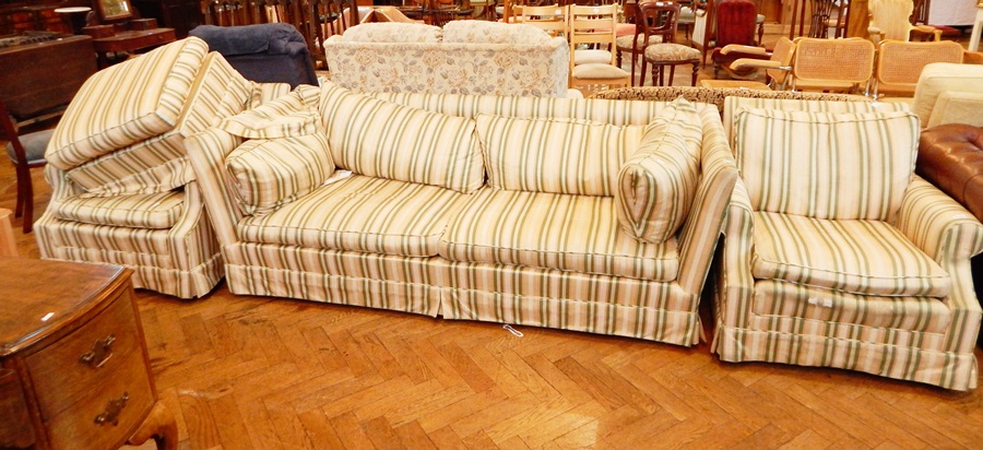 A Parker & Farr suite of furniture comprising a three seater settee with loose cushions,