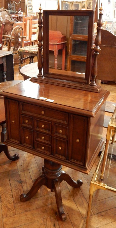 A Canaleto Spanish pedestal dressing table with two side drawers and seven miniature drawers,