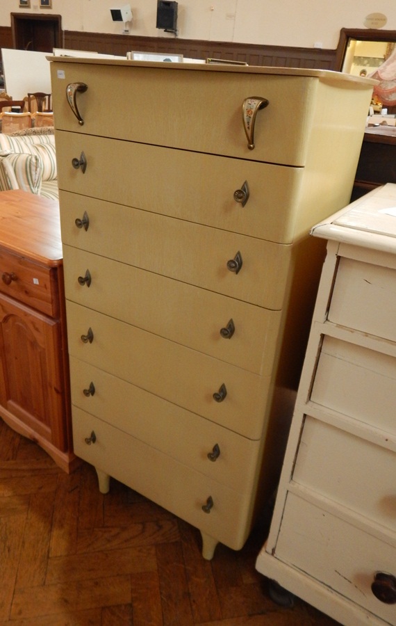 A modern painted chest of seven graduated drawers,